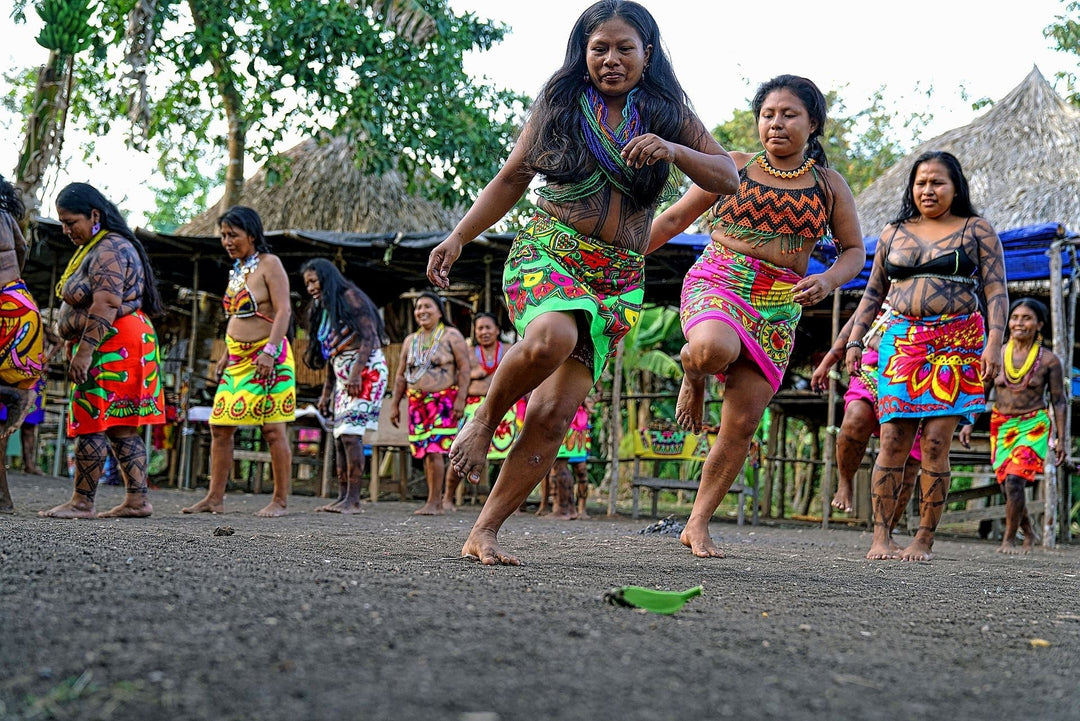 Who are the Emberá? Panama's Darién people. Rivers, genip dye, silver coins in family necklaces.