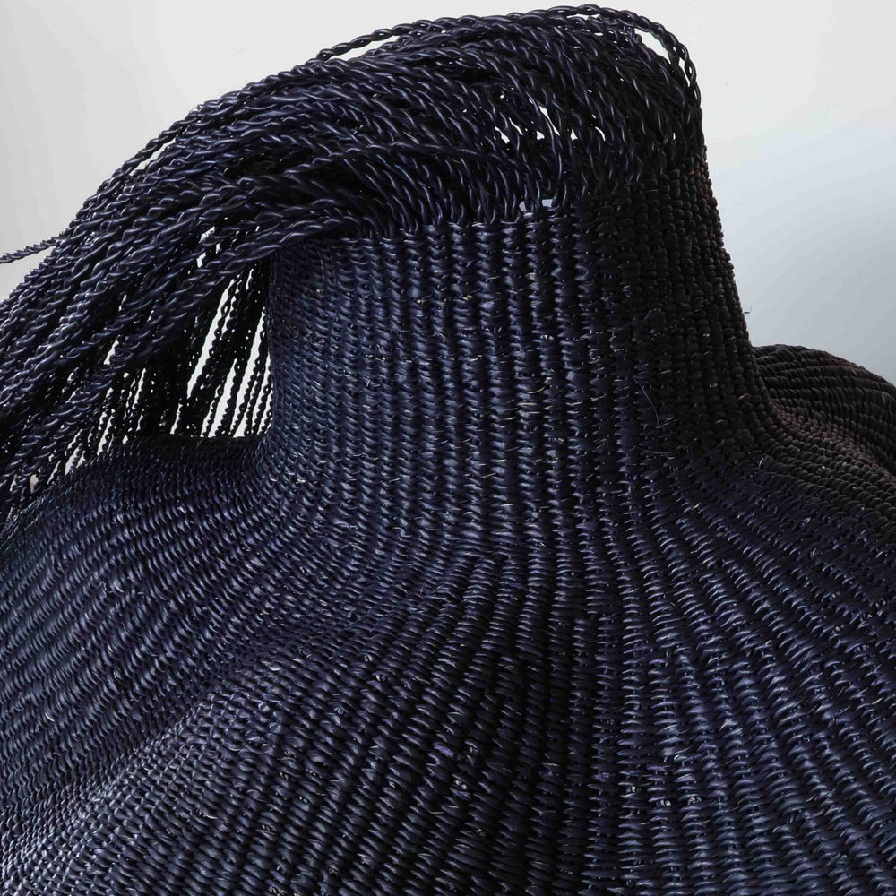 Close detail of the weave on the hairy black wavy basket