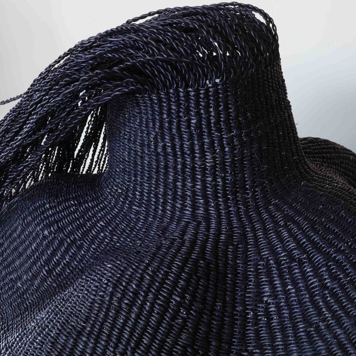 Close detail of the weave on the hairy black wavy basket