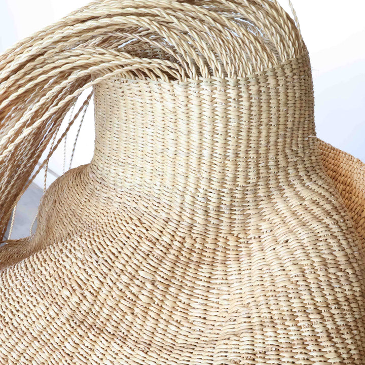 Close detail of the twist weave on the hairy natural wavy basket