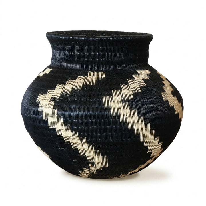 Ivory Cascade Jar, one of one werregue basket handwoven by Wounaan weavers in Chocó, Colombia