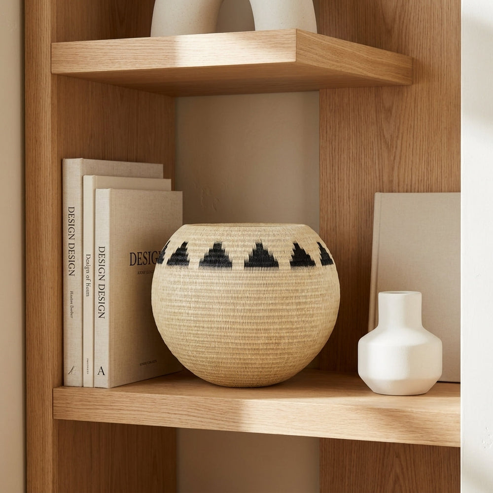 Mountain Ring Basket, one of one werregue basket handwoven by Wounaan weavers in Chocó, Colombia, styled on a shelf