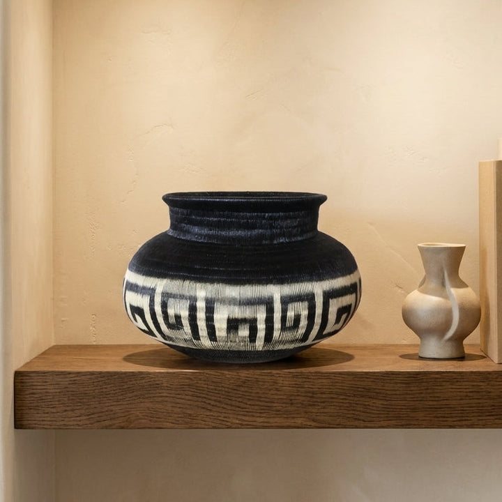 Key Band Jar, one of one werregue basket handwoven by Wounaan weavers in Chocó, Colombia, styled on a shelf
