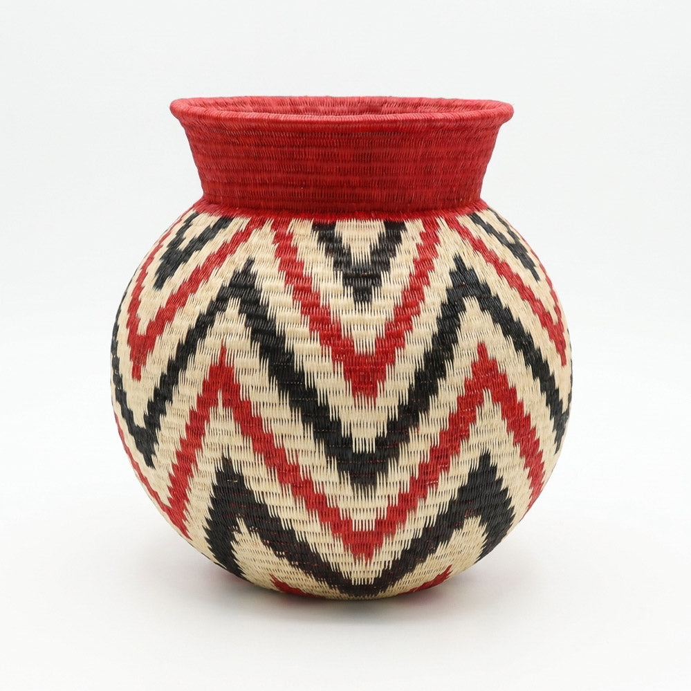 Crimson Flame Jar, one of one werregue basket handwoven by Wounaan weavers in Chocó, Colombia