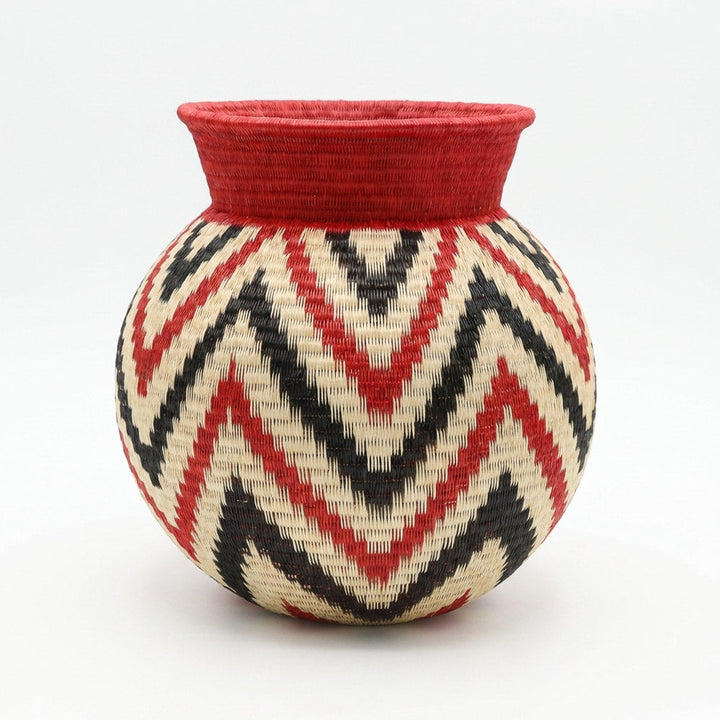 Crimson Flame Jar, one of one werregue basket handwoven by Wounaan weavers in Chocó, Colombia