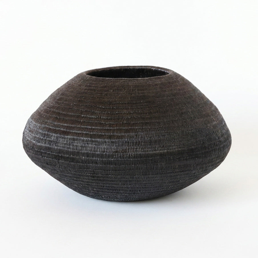 Black Halo Vessel, one of one werregue basket handwoven by Wounaan weavers in Chocó, Colombia