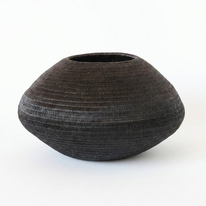 Black Halo Vessel, one of one werregue basket handwoven by Wounaan weavers in Chocó, Colombia