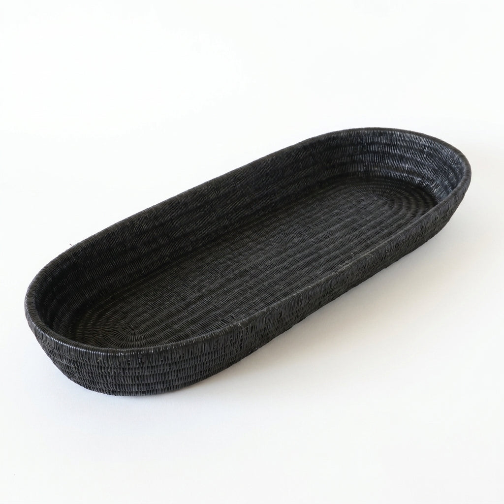 Midnight Platter, one of one werregue basket handwoven by Wounaan weavers in Chocó, Colombia