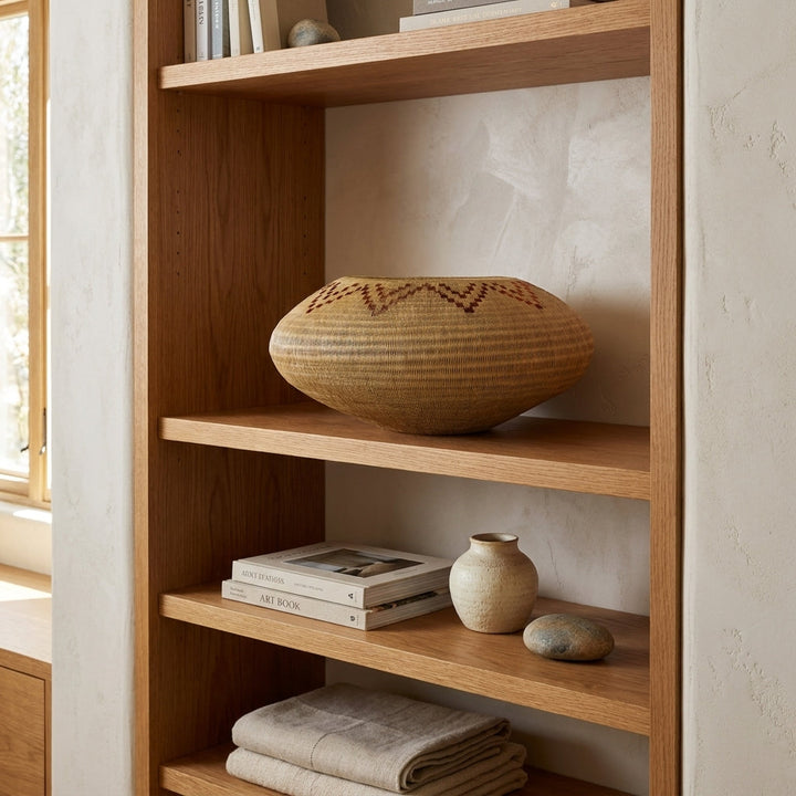 Copper Crown Vessel, one of one werregue basket handwoven by Wounaan weavers in Chocó, Colombia, styled on a shelf