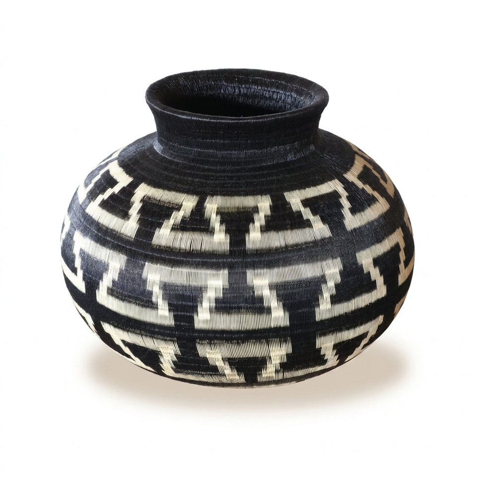 Bold Keys Globe, one of one werregue basket handwoven by Wounaan weavers in Chocó, Colombia