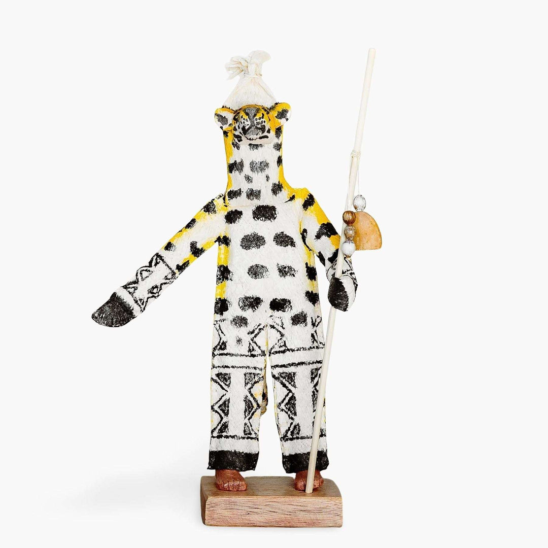Ticuna ceremonial doll jaguar herald figure with traditional dress from Colombian Amazon rainforest