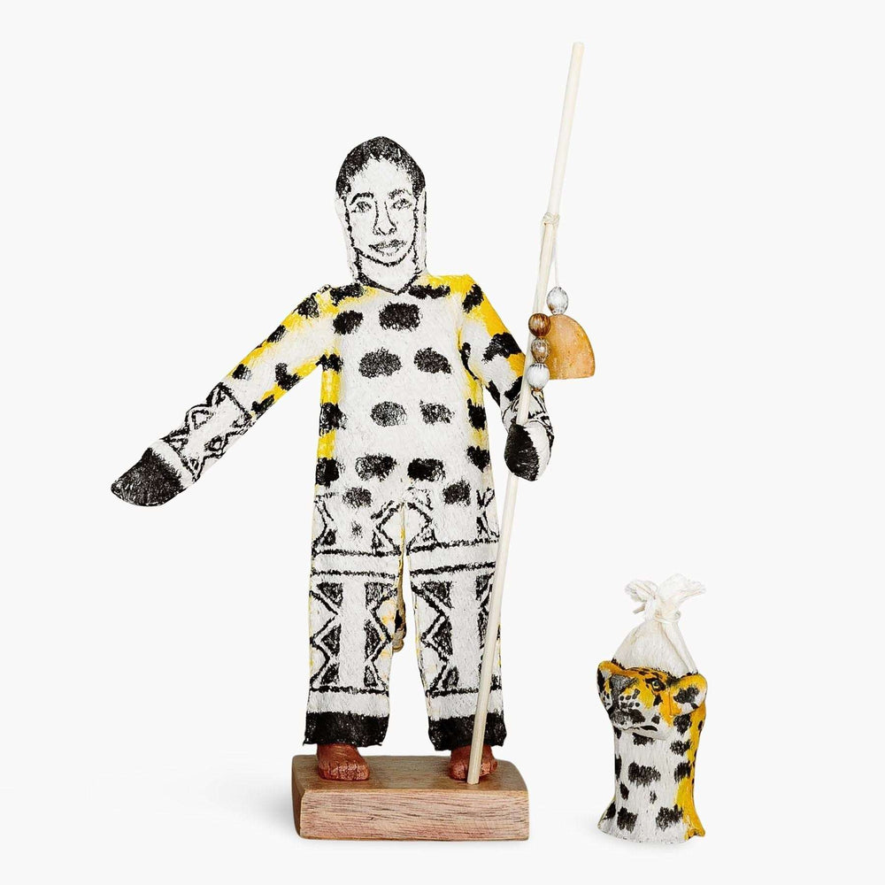 Hand-carved details of Ticuna jaguar ceremonial doll showing intricate traditional pigments and craftsmanship