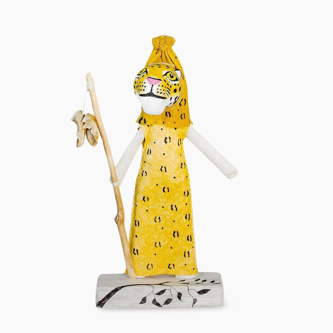 Close-up of hand-painted jaguar spirit symbols on Ticuna ceremonial doll