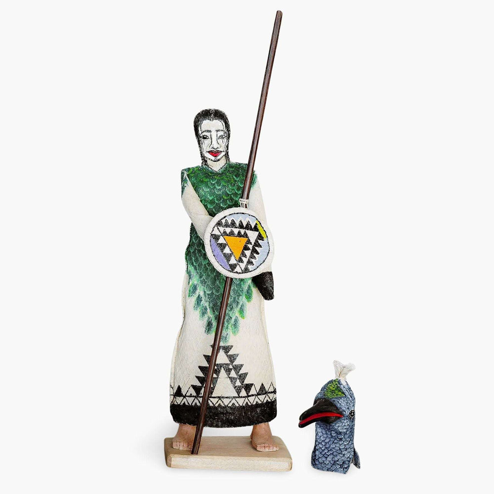Close-up traditional beadwork detail on Ticuna hummingbird ceremonial doll without mask