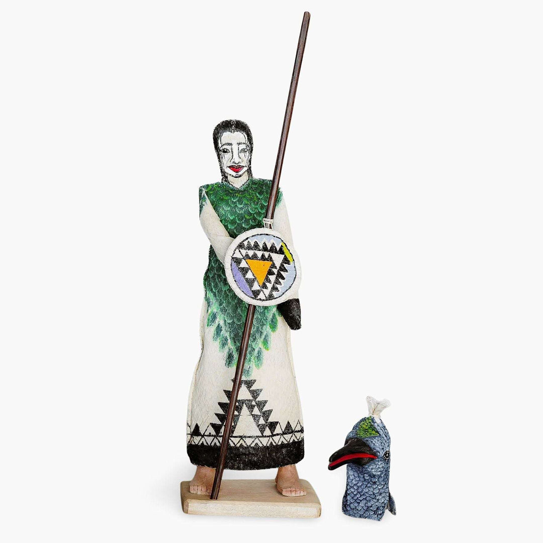 Close-up traditional beadwork detail on Ticuna hummingbird ceremonial doll without mask