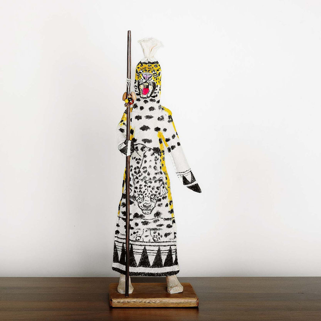 Handcrafted jaguar Ticuna ceremonial doll with spotted pattern and natural pigments from Colombian Amazon