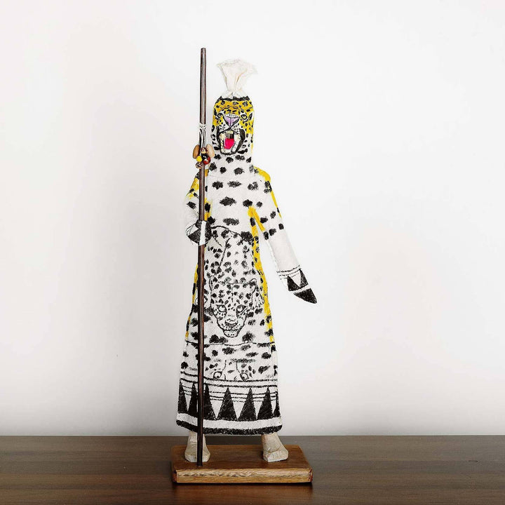 Handcrafted jaguar Ticuna ceremonial doll with spotted pattern and natural pigments from Colombian Amazon
