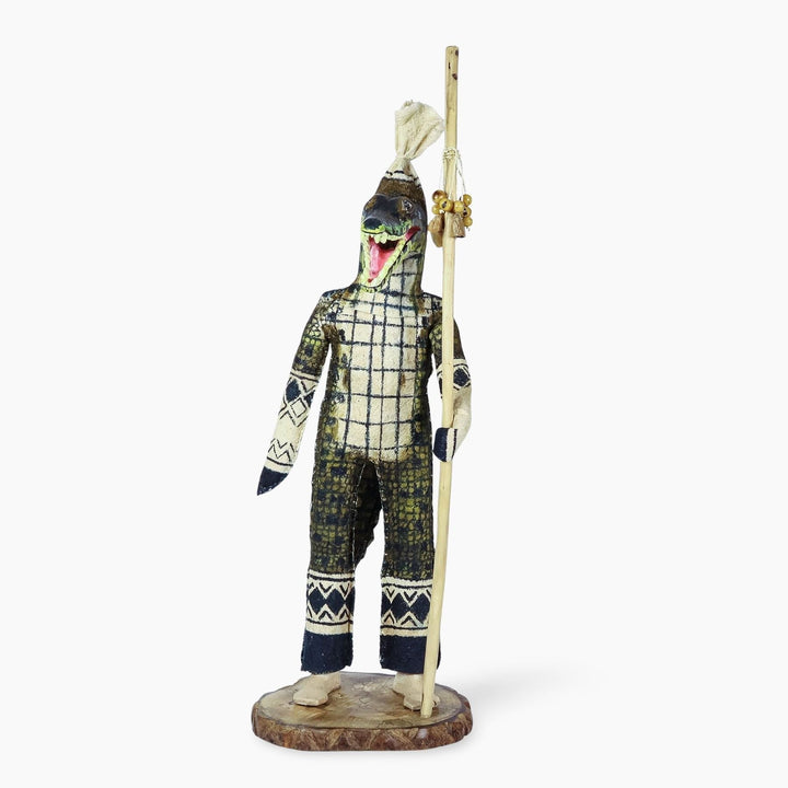 Front view of ceremonial Ticuna crocodile spirit doll showing traditional Amazonian craftsmanship