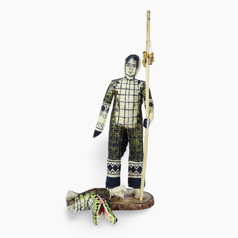 Front view of ceremonial Ticuna crocodile spirit doll without mask showing traditional Amazonian craftsmanship