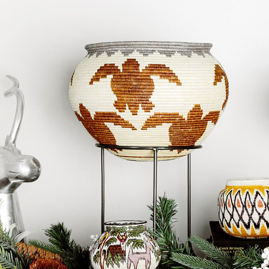 Large decorative basket with turtle path design handwoven in natural palm fiber by indigenous artisans