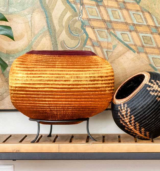 Radiant horizon basket displayed as decorative art in modern living room interior