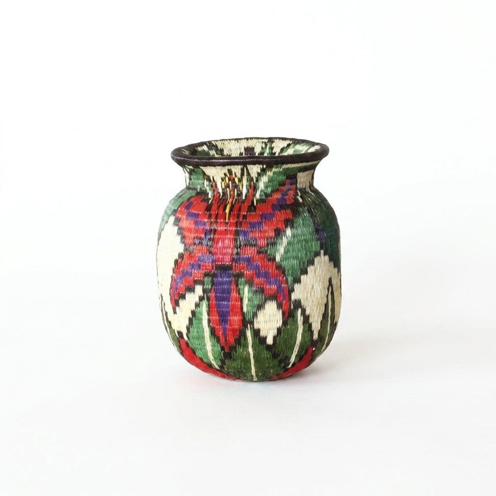 Handwoven Wounaan basket with red and purple blossom and green leaves on ivory, floral miniature from Panama