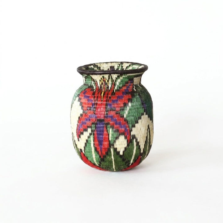 Handwoven Wounaan basket with red and purple blossom and green leaves on ivory, floral miniature from Panama