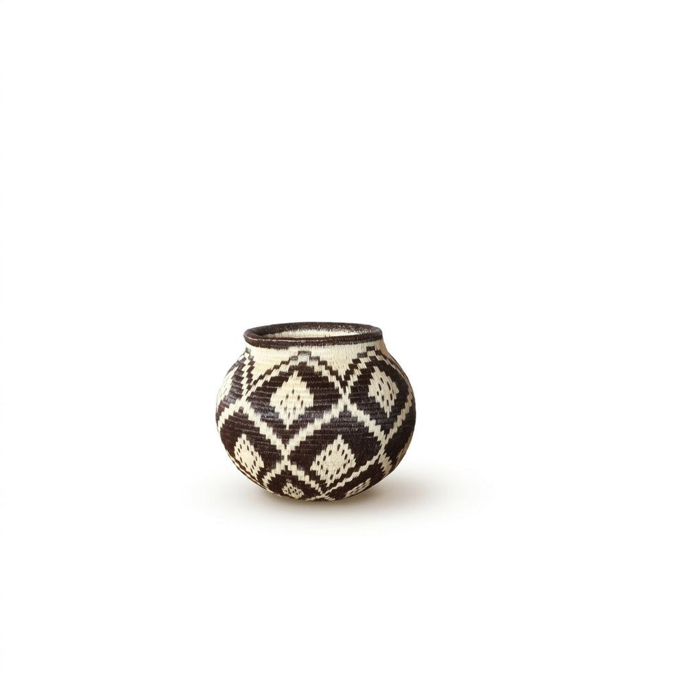 Handwoven Wounaan basket with brown-black and cream nested diamond lattice pattern, rounded vessel from Panama