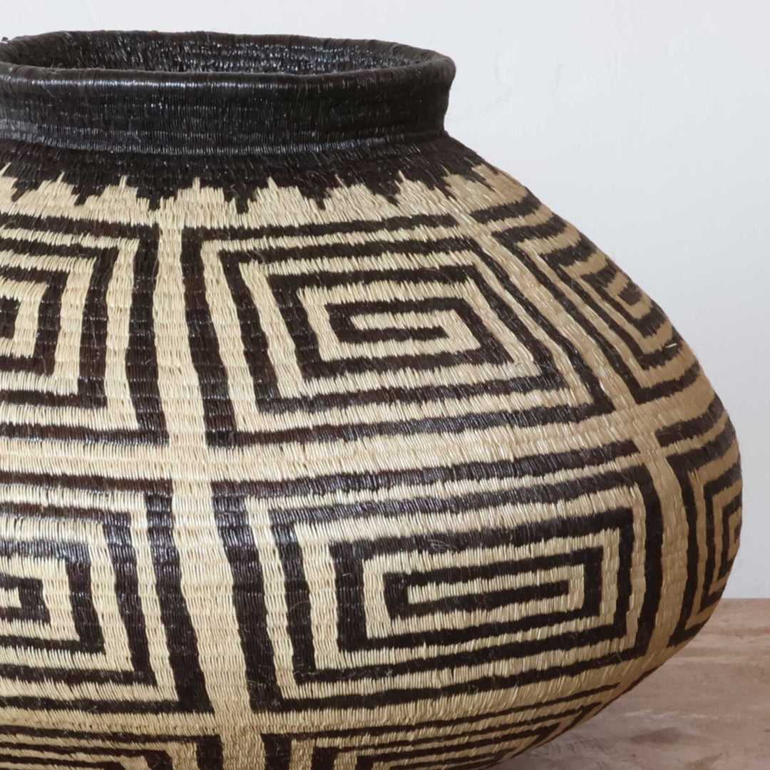 Close-up of intricate geometric crossroads weave pattern showing traditional craftsmanship
