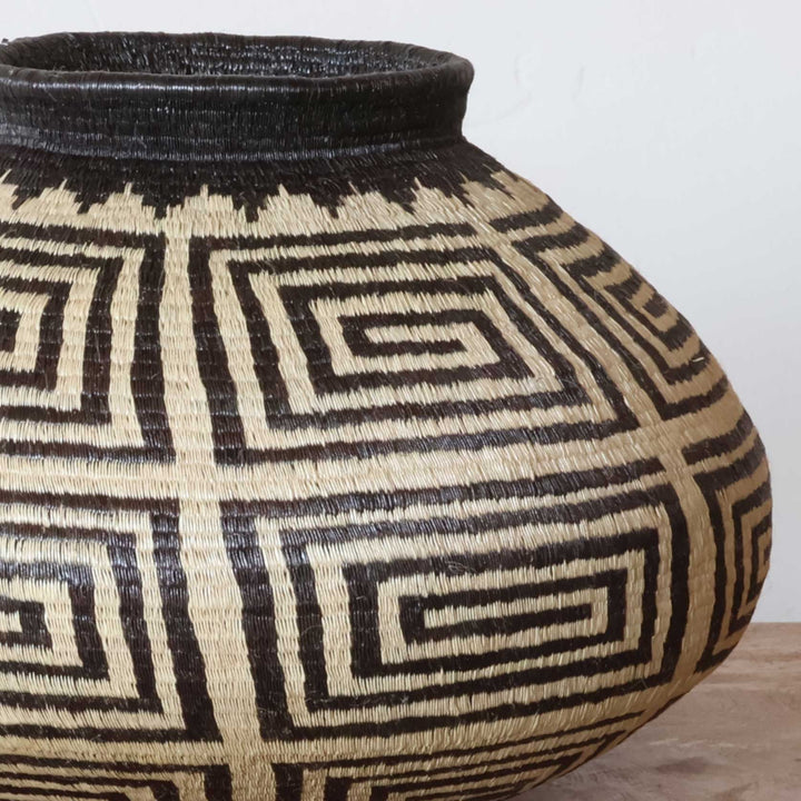 Close-up of intricate geometric crossroads weave pattern showing traditional craftsmanship