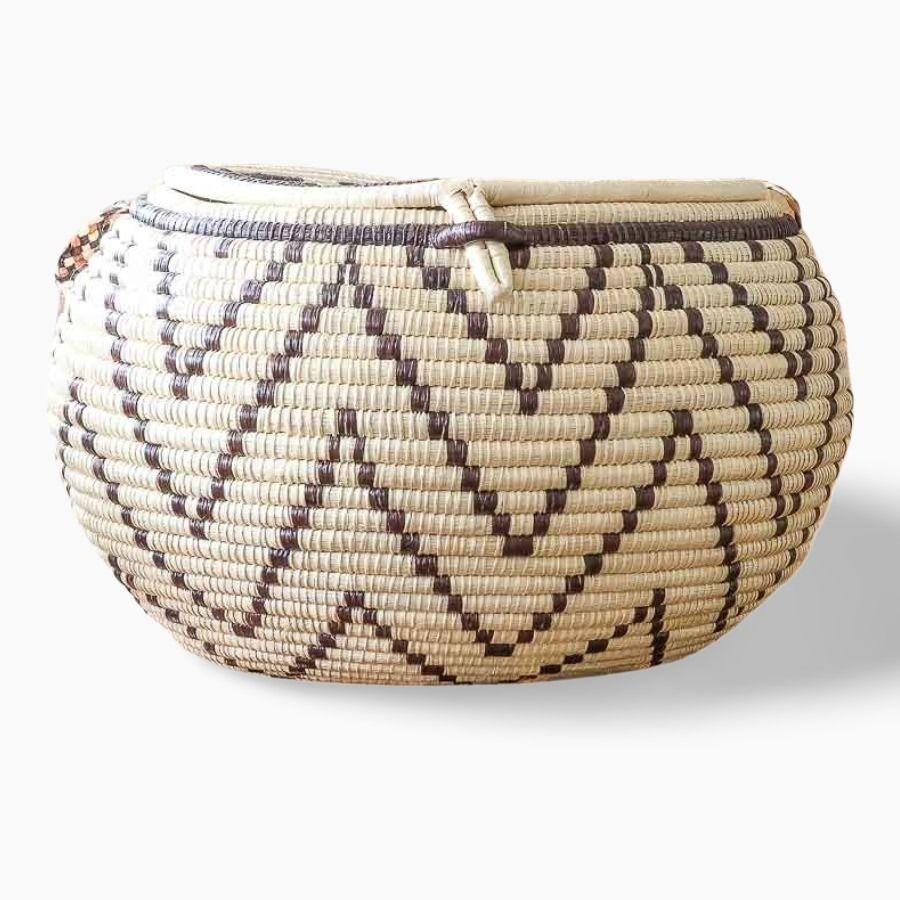 Side view of decorative woven basket showing depth and traditional palm fiber craftsmanship from Panama