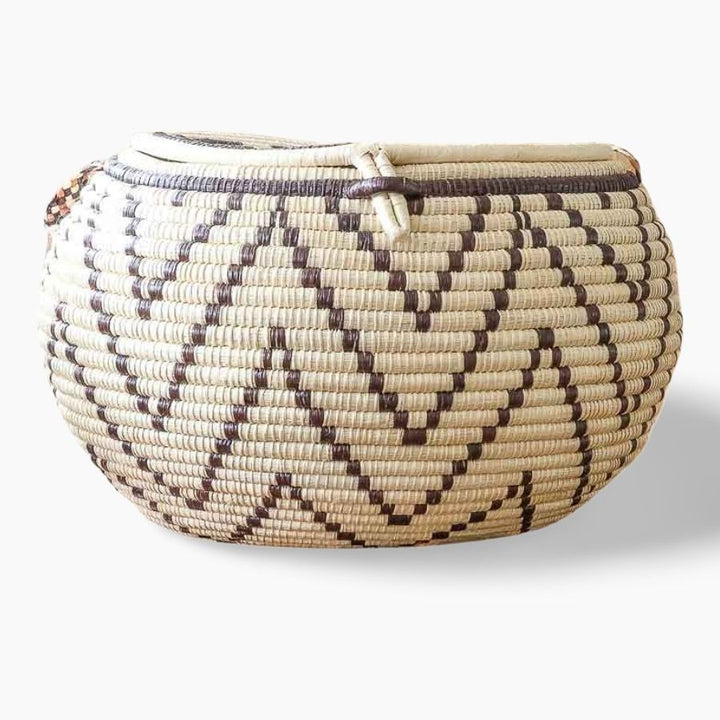 Side view of decorative woven basket showing depth and traditional palm fiber craftsmanship from Panama