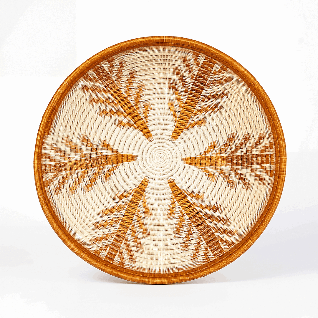 Large copper vines decorative plate handwoven with metallic bronze palm fibers in botanical spiral pattern