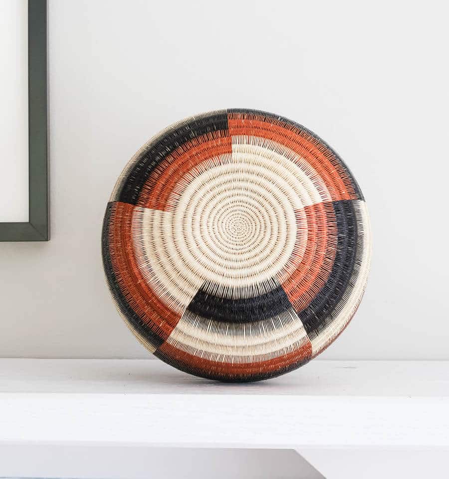 rear view of handmade decorative basket showing dimensional wide steps geometric weave pattern