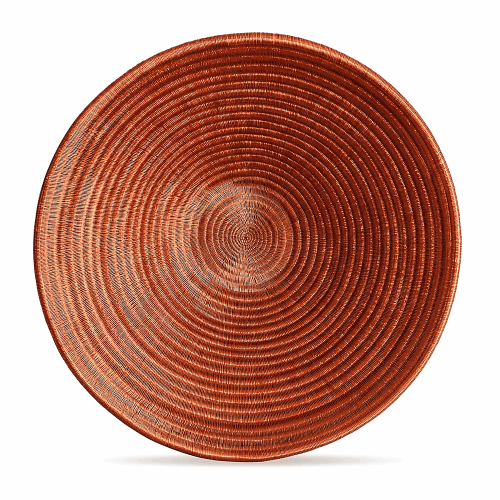 Large molten gold decorative woven plate with flowing amber patterns handcrafted by indigenous artisans