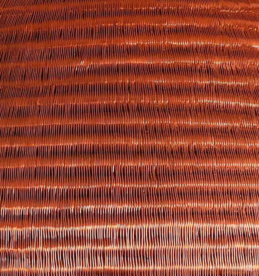 Close-up tight weave pattern detail of handmade tapered basket showing premium palm fiber craftsmanship
