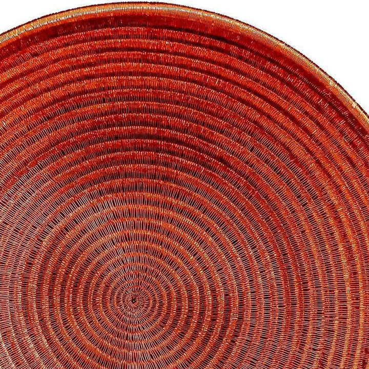 Close-up detail of copper wire wrapping over werregue palm fiber showing Sunweight radial structure
