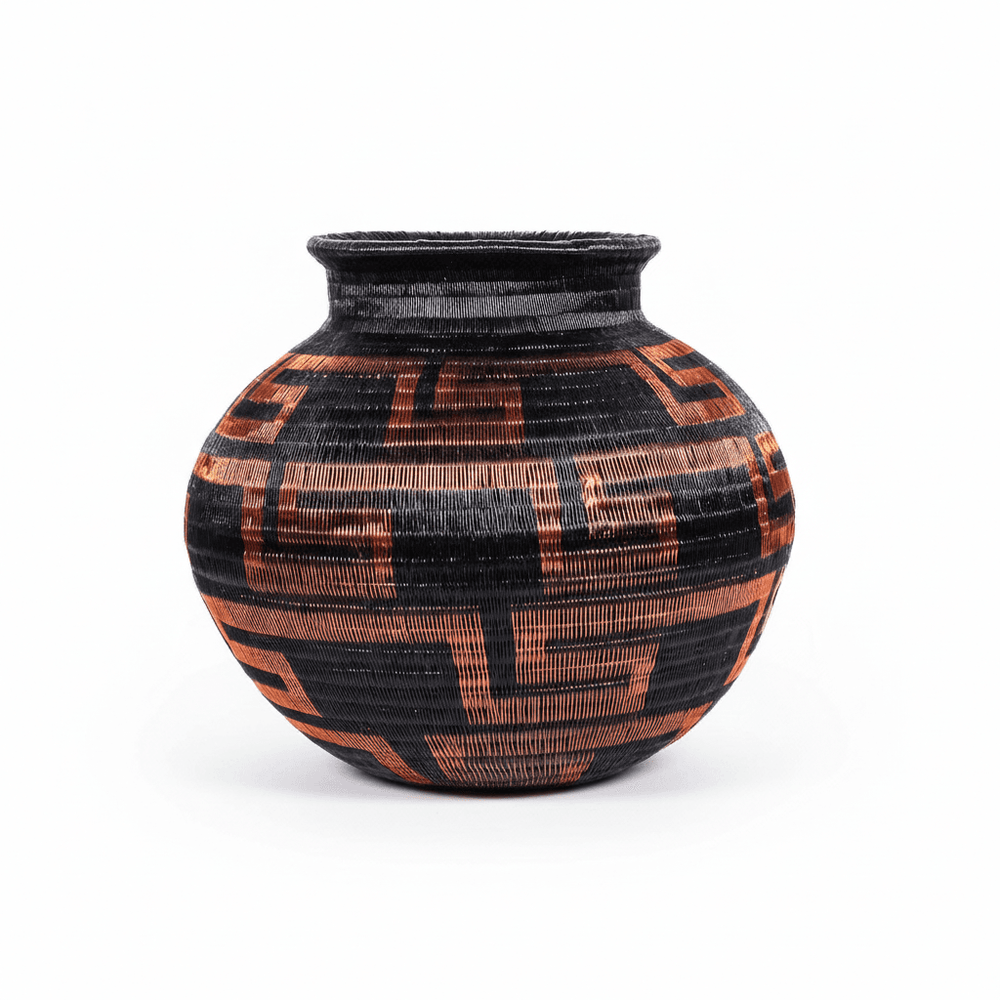 Side view showing vessel form and depth of geometric weave pattern