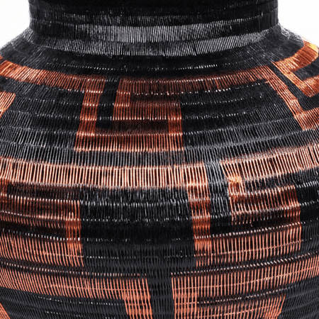 Side view showing vessel form and depth of geometric weave pattern