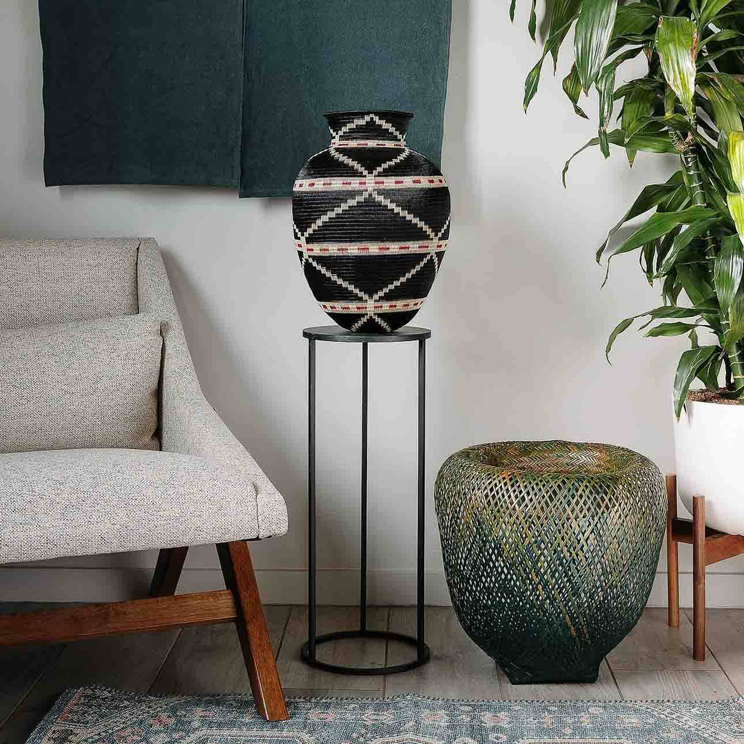 Colombian Wounaan basket displayed on a modern console table as decorative art in a contemporary interior