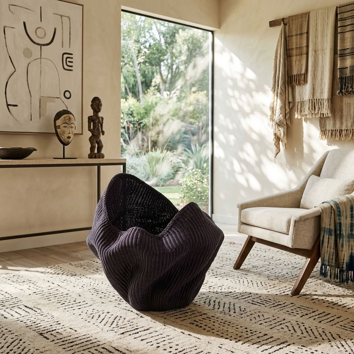 Indigo wavy sculptural basket styled in an interior