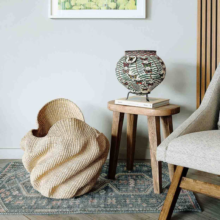 Handmade Ghana basket displayed as accent decor on modern interior setting