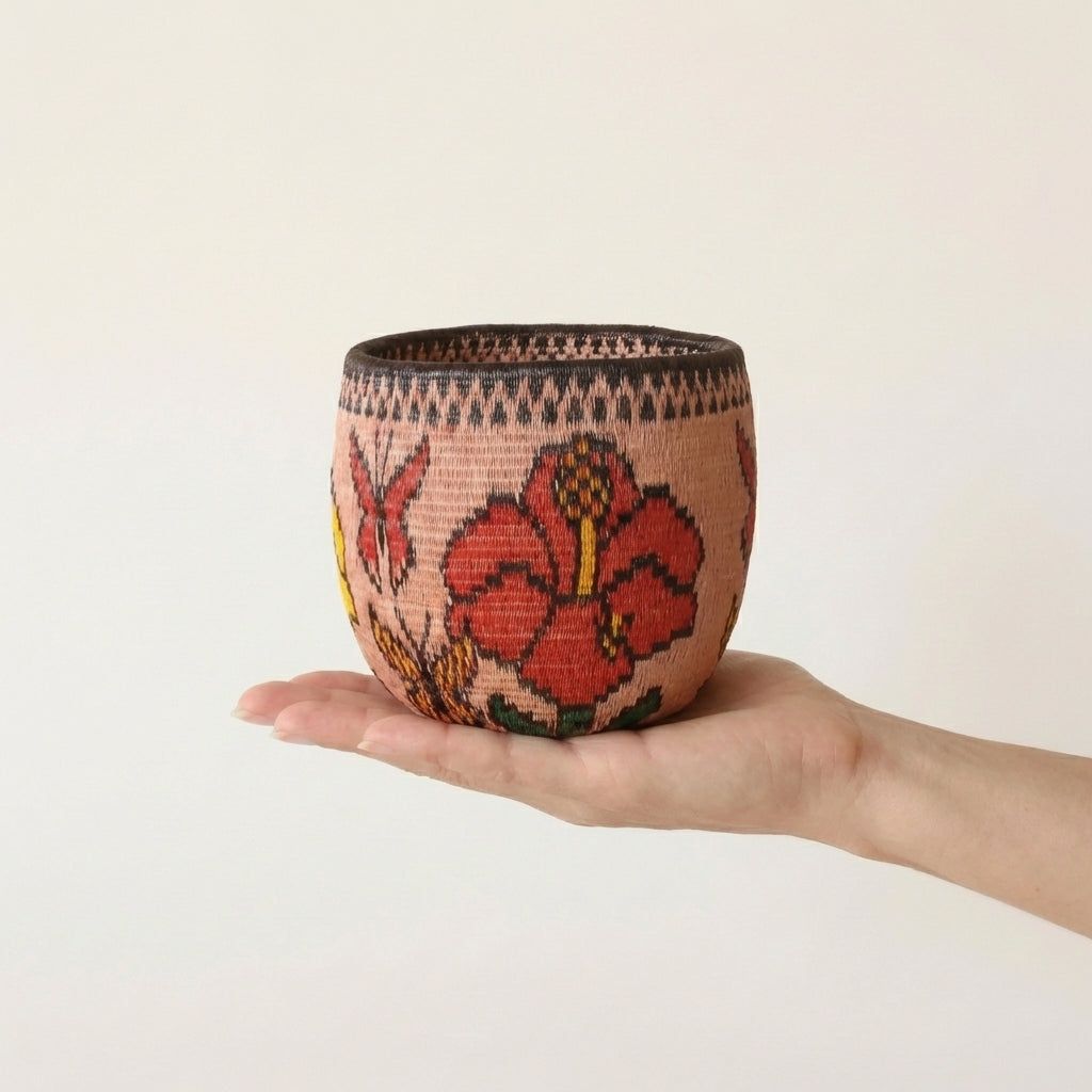 Small open bowl handmade basket with floral flight pattern by Wounaan artisans from Panama