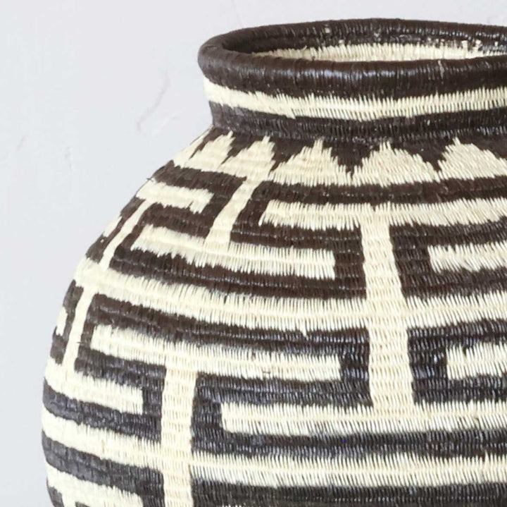 Close-up detail of labyrinth line weave pattern showing expert craftsmanship and texture