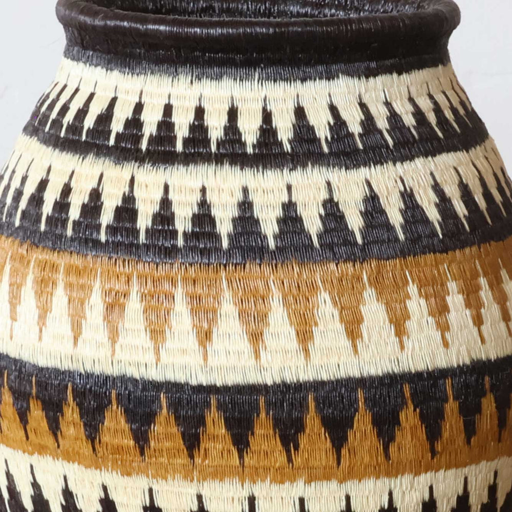 Close-up werregue palm fiber triangular weave pattern showing Wounaan craftsmanship detail