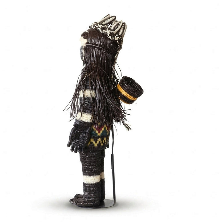 “She Who Gathers” handwoven Emberá Cunana muñeca, female provider figure with feathered crown and gathering basket, side view