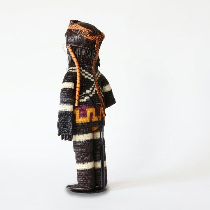 “The Hunter” handwoven Emberá Cunana muñeca, male figure with a bow and arrow with red loincloth, side view