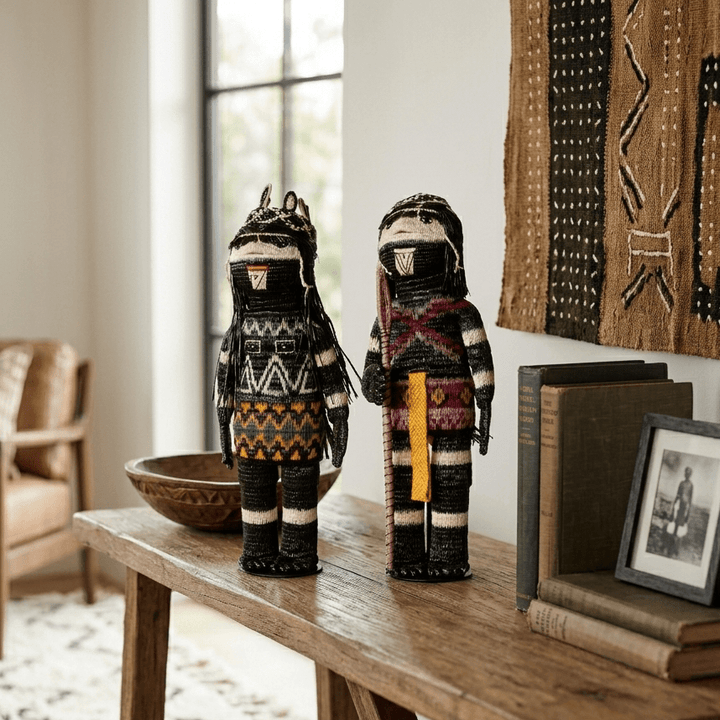 The Provider and The Spearman, a pair of handwoven Cunana munecas styled together in a room