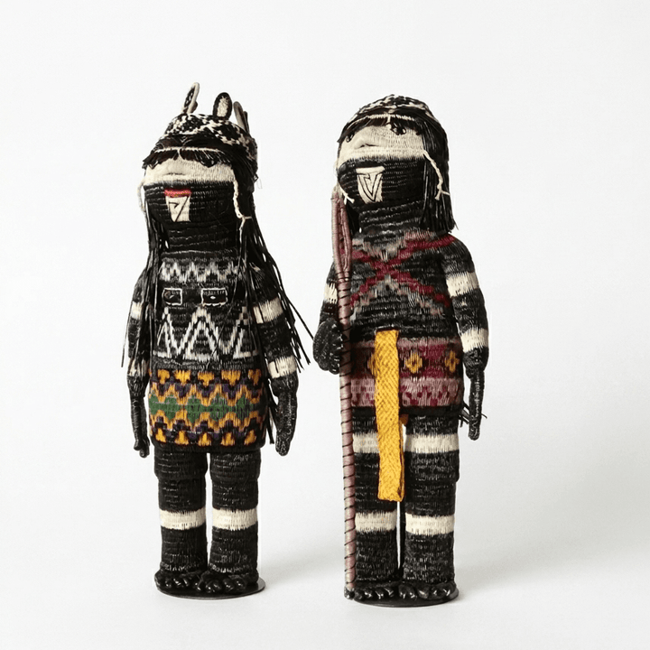 The Provider and The Spearman shown together, handwoven Embera figures from Panama
