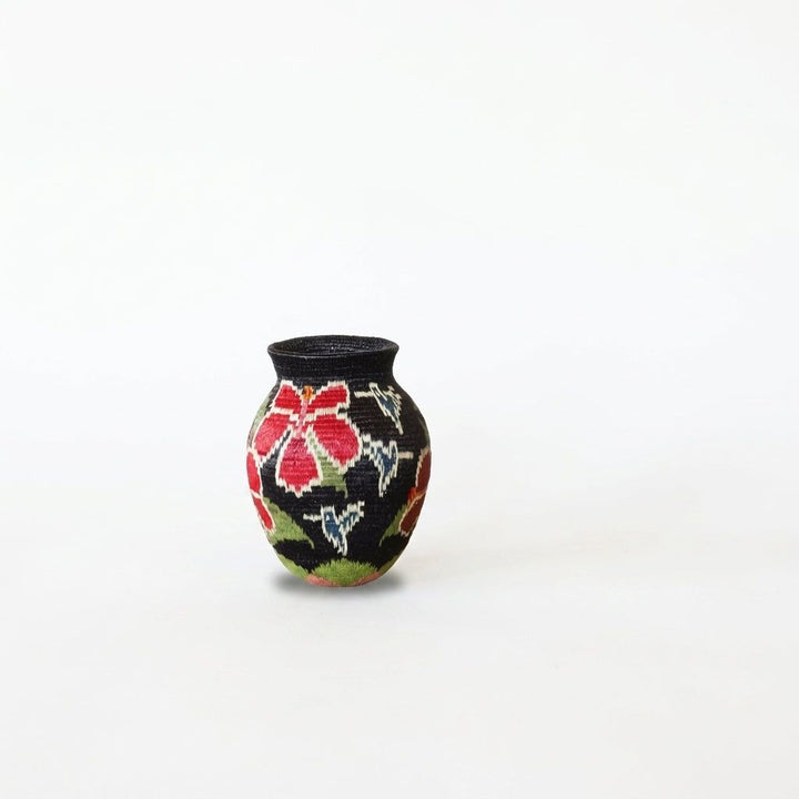 Mini Wounaan handwoven basket with red hibiscus and blue hummingbirds on black ground, Darién Panama woven art